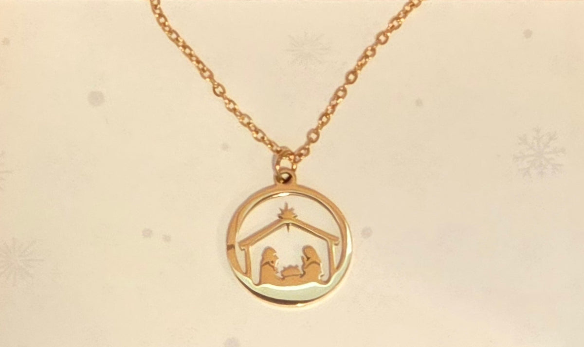 Manger necklace inspired by the nativity in gold-plated stainless steel